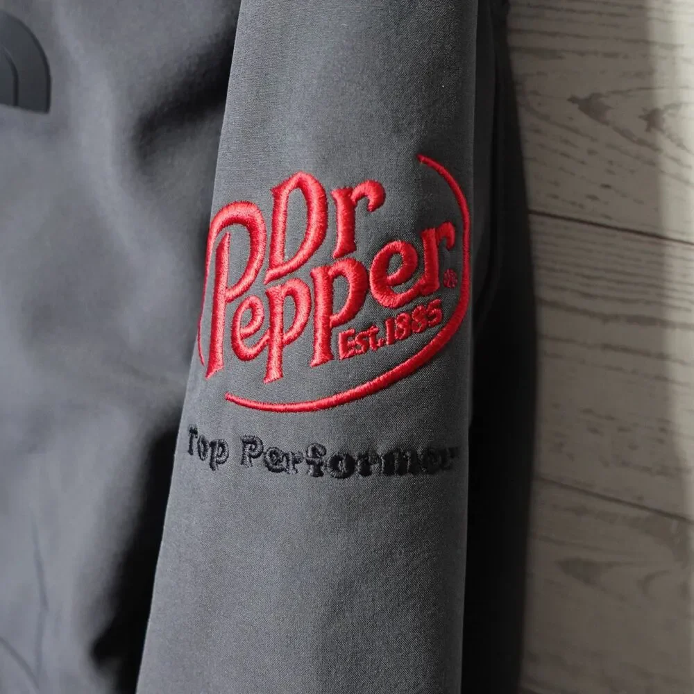 The North Face Jacket Mens sizde XL charcoal gray has Dr.Pepper embroidery